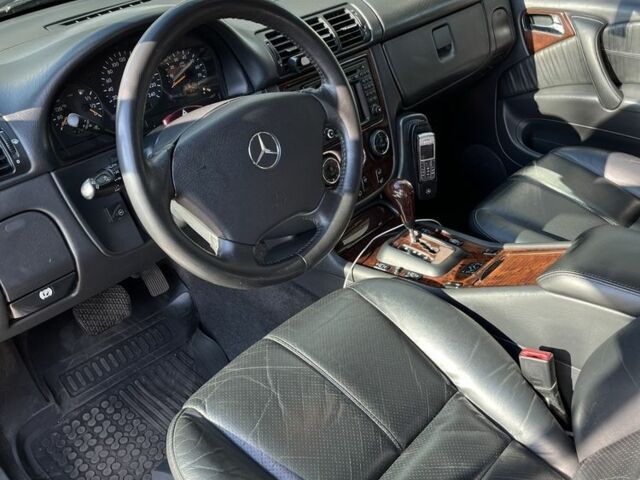 Черный Мерседес МЛ 500, объемом двигателя 5 л и пробегом 378 тыс. км за 7100 $, фото 11 на Automoto.ua