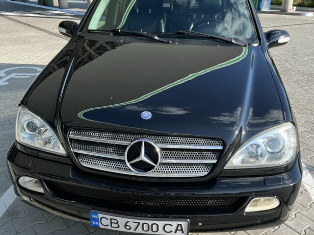 Черный Мерседес МЛ 500, объемом двигателя 5 л и пробегом 378 тыс. км за 7100 $, фото 2 на Automoto.ua