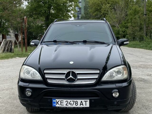 Черный Мерседес МЛ 55 АМГ, объемом двигателя 5.4 л и пробегом 125 тыс. км за 12000 $, фото 5 на Automoto.ua