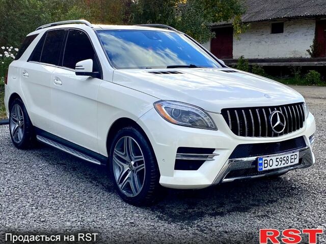 Білий Мерседес МЛ класс, об'ємом двигуна 3 л та пробігом 240 тис. км за 21800 $, фото 13 на Automoto.ua