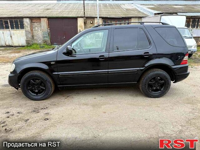 Черный Мерседес МЛ класс, объемом двигателя 3.2 л и пробегом 286 тыс. км за 3000 $, фото 4 на Automoto.ua