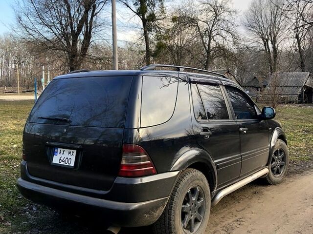 Чорний Мерседес ML-Class, об'ємом двигуна 4.3 л та пробігом 300 тис. км за 6500 $, фото 3 на Automoto.ua