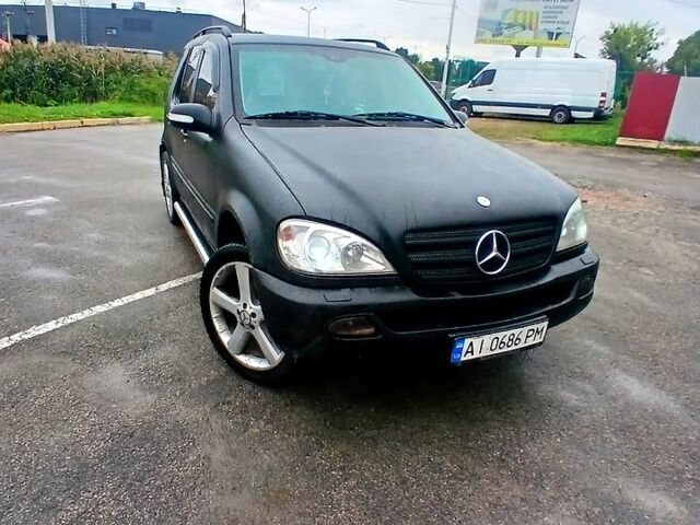 Черный Мерседес МЛ класс, объемом двигателя 3.2 л и пробегом 400 тыс. км за 5800 $, фото 4 на Automoto.ua