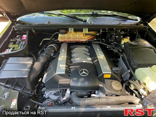 Чорний Мерседес ML-Class, об'ємом двигуна 5.4 л та пробігом 124 тис. км за 12000 $, фото 3 на Automoto.ua