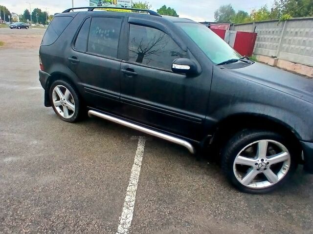 Черный Мерседес МЛ класс, объемом двигателя 3.2 л и пробегом 400 тыс. км за 5800 $, фото 6 на Automoto.ua