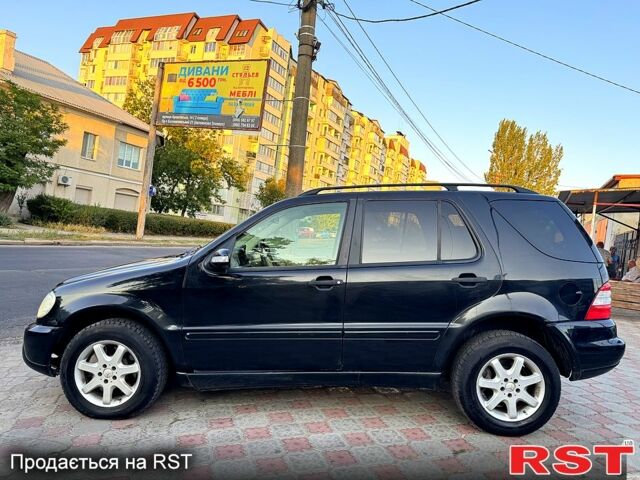 Чорний Мерседес МЛ класс, об'ємом двигуна 2.7 л та пробігом 300 тис. км за 4400 $, фото 5 на Automoto.ua