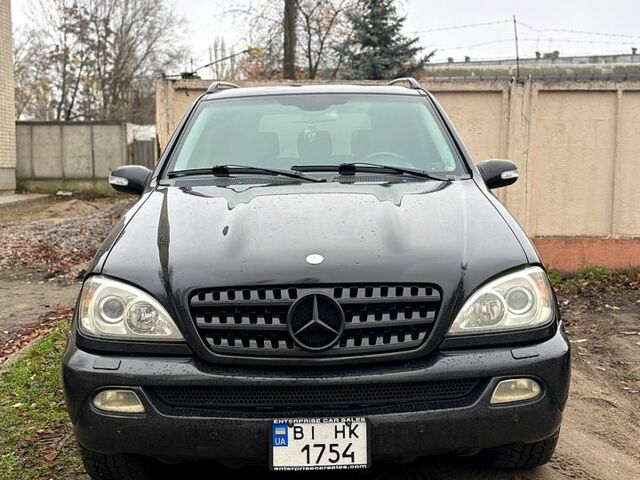 Черный Мерседес МЛ класс, объемом двигателя 3.7 л и пробегом 270 тыс. км за 8999 $, фото 3 на Automoto.ua