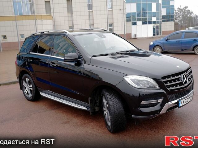 Чорний Мерседес МЛ класс, об'ємом двигуна 3 л та пробігом 255 тис. км за 25000 $, фото 6 на Automoto.ua