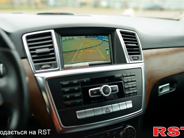 Чорний Мерседес МЛ класс, об'ємом двигуна 3 л та пробігом 255 тис. км за 25000 $, фото 9 на Automoto.ua