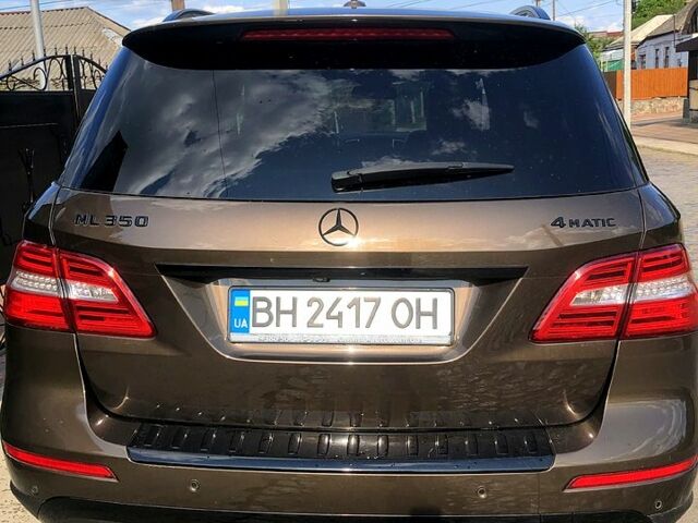 Коричневый Мерседес МЛ класс, объемом двигателя 3.5 л и пробегом 257 тыс. км за 15900 $, фото 4 на Automoto.ua