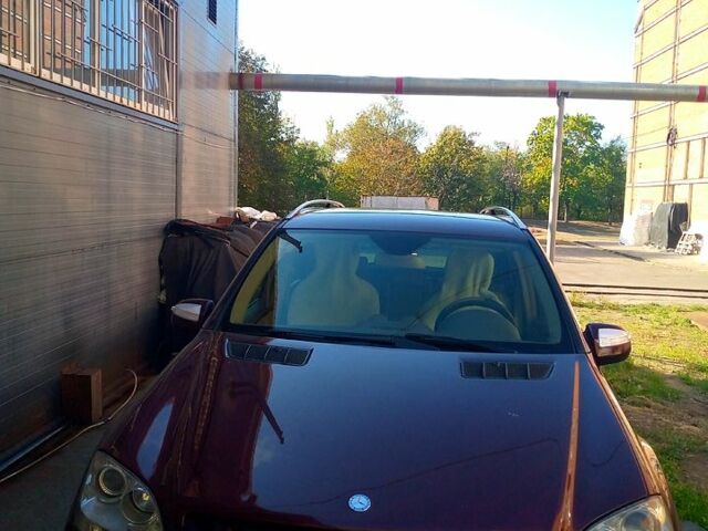 Красный Мерседес МЛ класс, объемом двигателя 3.5 л и пробегом 347 тыс. км за 13300 $, фото 4 на Automoto.ua