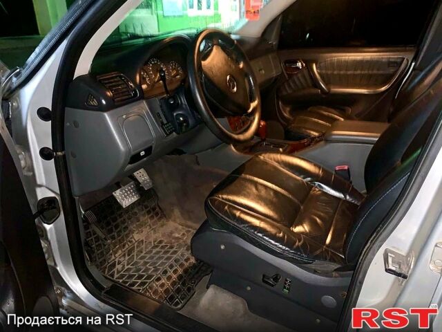 Сірий Мерседес МЛ класс, об'ємом двигуна 4.3 л та пробігом 275 тис. км за 5450 $, фото 4 на Automoto.ua