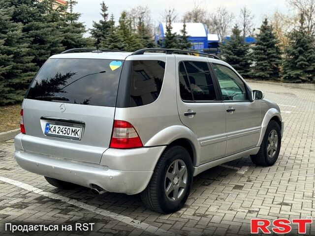 Сірий Мерседес ML-Class, об'ємом двигуна 4 л та пробігом 312 тис. км за 8999 $, фото 3 на Automoto.ua