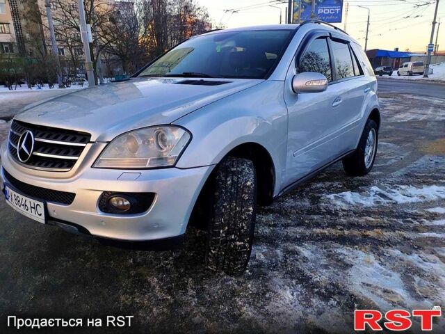 Сірий Мерседес ML-Class, об'ємом двигуна 3.5 л та пробігом 200 тис. км за 9500 $, фото 2 на Automoto.ua