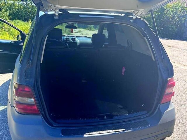 Серый Мерседес МЛ класс, объемом двигателя 3 л и пробегом 250 тыс. км за 6000 $, фото 4 на Automoto.ua