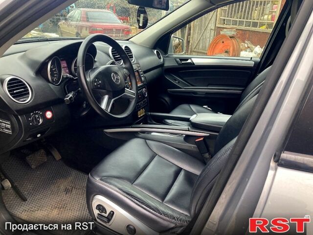 Сірий Мерседес МЛ класс, об'ємом двигуна 3 л та пробігом 328 тис. км за 12800 $, фото 6 на Automoto.ua