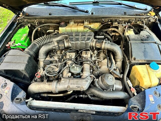 Синий Мерседес МЛ класс, объемом двигателя 4 л и пробегом 200 тыс. км за 4500 $, фото 8 на Automoto.ua