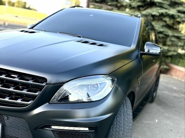 Білий Мерседес МЛ, об'ємом двигуна 5.5 л та пробігом 125 тис. км за 32650 $, фото 1 на Automoto.ua