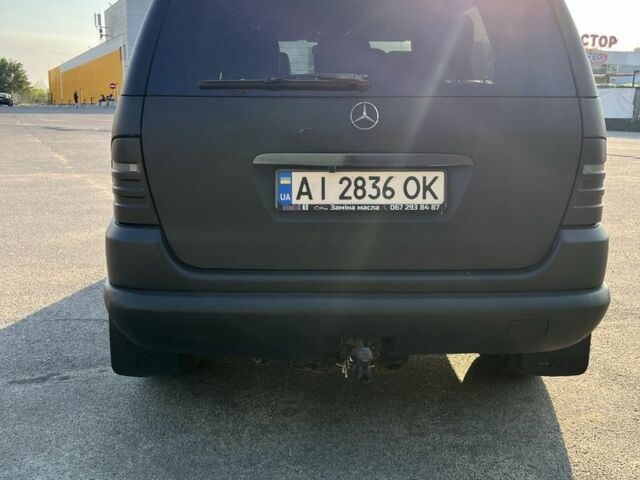 Чорний Мерседес МЛ, об'ємом двигуна 2.7 л та пробігом 240 тис. км за 5299 $, фото 2 на Automoto.ua
