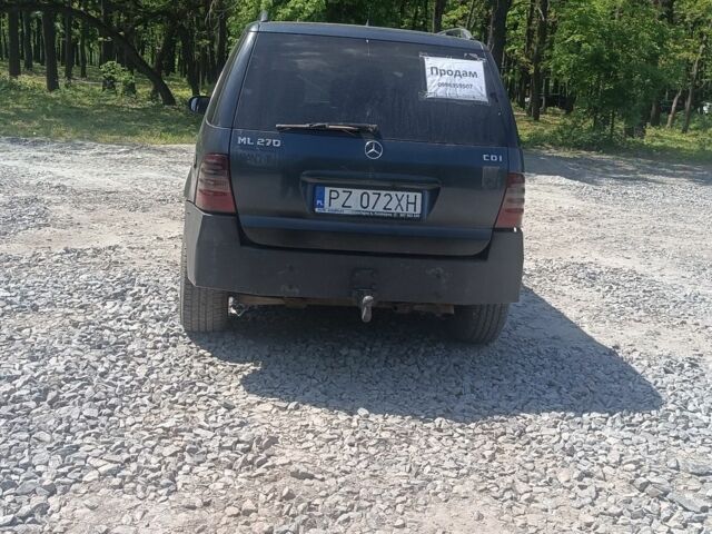 Черный Мерседес МЛ, объемом двигателя 2 л и пробегом 270 тыс. км за 4000 $, фото 1 на Automoto.ua