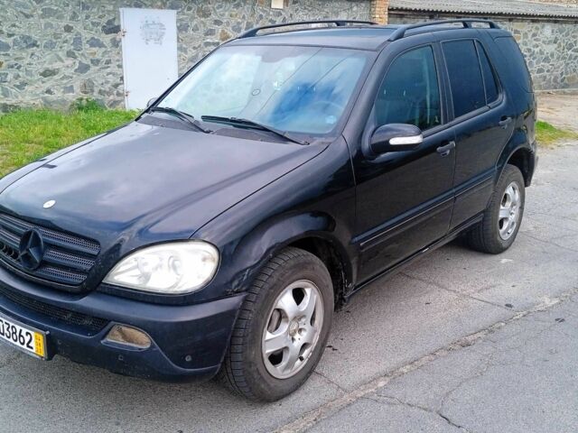 Чорний Мерседес МЛ, об'ємом двигуна 2.7 л та пробігом 305 тис. км за 165000 $, фото 8 на Automoto.ua
