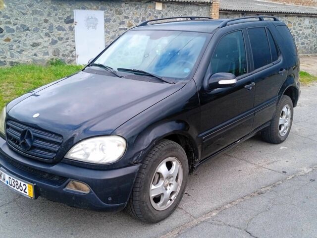 Чорний Мерседес МЛ, об'ємом двигуна 2.7 л та пробігом 305 тис. км за 165000 $, фото 4 на Automoto.ua