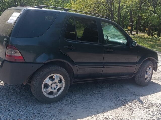 Черный Мерседес МЛ, объемом двигателя 2 л и пробегом 270 тыс. км за 4000 $, фото 2 на Automoto.ua