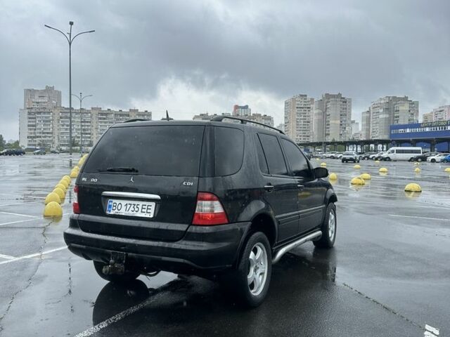 Чорний Мерседес МЛ, об'ємом двигуна 4 л та пробігом 250 тис. км за 4999 $, фото 14 на Automoto.ua