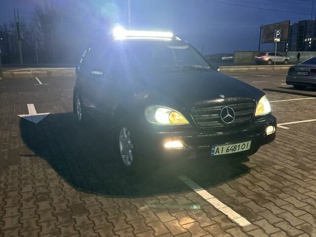 Чорний Мерседес МЛ, об'ємом двигуна 2.7 л та пробігом 384 тис. км за 7600 $, фото 2 на Automoto.ua