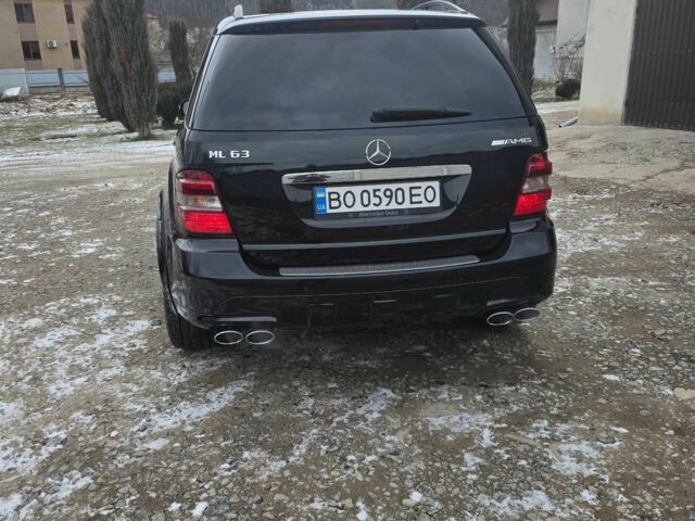 Чорний Мерседес МЛ, об'ємом двигуна 6.2 л та пробігом 218 тис. км за 13000 $, фото 14 на Automoto.ua