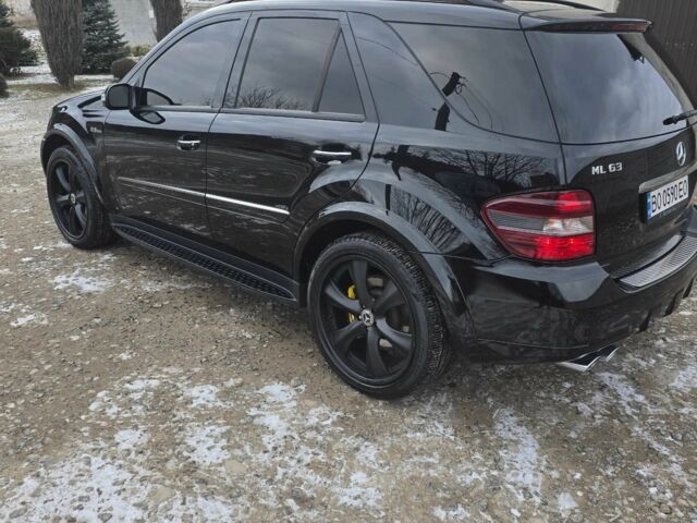 Чорний Мерседес МЛ, об'ємом двигуна 6.2 л та пробігом 218 тис. км за 14500 $, фото 15 на Automoto.ua