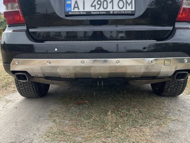Чорний Мерседес МЛ, об'ємом двигуна 3 л та пробігом 131 тис. км за 12300 $, фото 11 на Automoto.ua