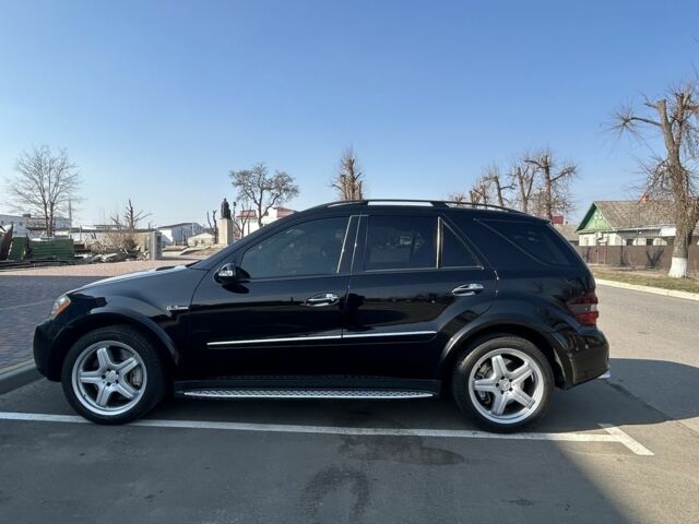 Чорний Мерседес МЛ, об'ємом двигуна 6.2 л та пробігом 171 тис. км за 14500 $, фото 2 на Automoto.ua