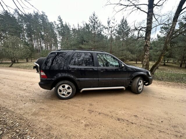 Чорний Мерседес ML серия, об'ємом двигуна 0.27 л та пробігом 328 тис. км за 4343 $, фото 2 на Automoto.ua