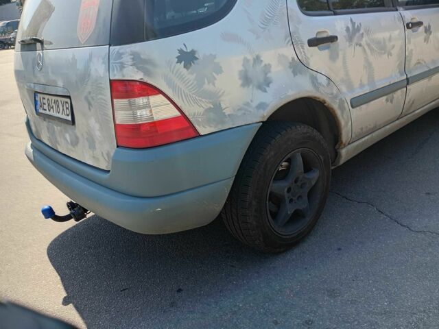 Сірий Мерседес МЛ, об'ємом двигуна 3.2 л та пробігом 515 тис. км за 4350 $, фото 5 на Automoto.ua