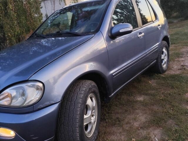 Сірий Мерседес МЛ, об'ємом двигуна 2.7 л та пробігом 423 тис. км за 4000 $, фото 8 на Automoto.ua