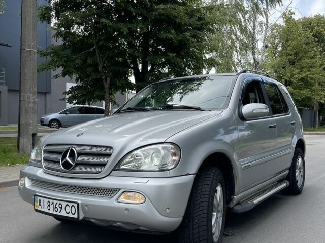 Серый Мерседес МЛ, объемом двигателя 3.7 л и пробегом 318 тыс. км за 5500 $, фото 1 на Automoto.ua