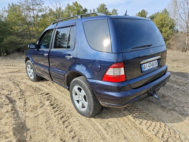 Синій Мерседес МЛ, об'ємом двигуна 4 л та пробігом 330 тис. км за 6500 $, фото 4 на Automoto.ua