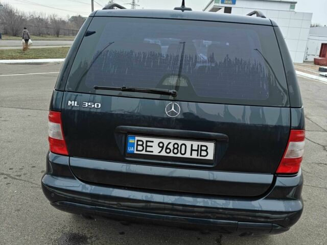 Синій Мерседес МЛ, об'ємом двигуна 3.5 л та пробігом 280 тис. км за 7500 $, фото 3 на Automoto.ua