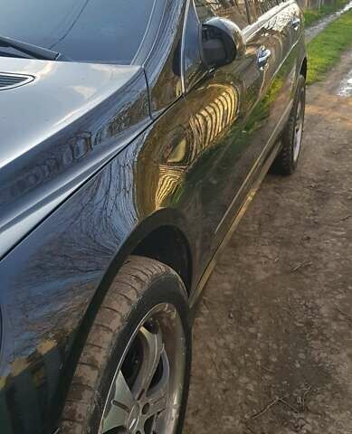 Чорний Мерседес Р-Клас, об'ємом двигуна 5 л та пробігом 259 тис. км за 9000 $, фото 9 на Automoto.ua