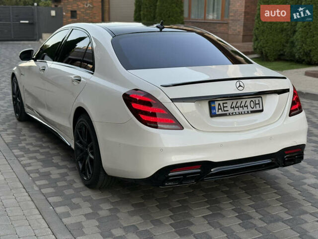 Білий Мерседес С Клас, об'ємом двигуна 3.98 л та пробігом 75 тис. км за 53000 $, фото 2 на Automoto.ua
