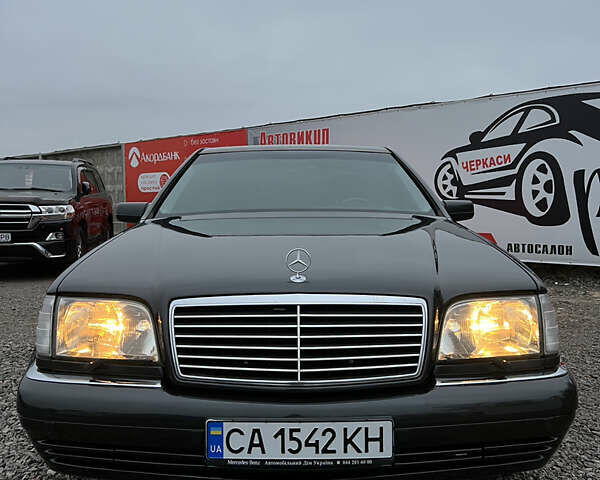 Черный Мерседес С Класс, объемом двигателя 5 л и пробегом 312 тыс. км за 23000 $, фото 1 на Automoto.ua