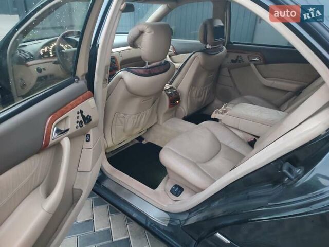 Черный Мерседес С Класс, объемом двигателя 4.97 л и пробегом 360 тыс. км за 5400 $, фото 25 на Automoto.ua