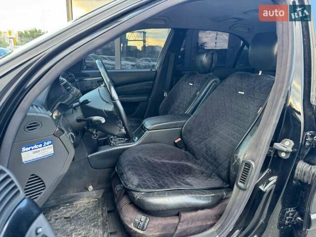 Черный Мерседес С Класс, объемом двигателя 4.97 л и пробегом 299 тыс. км за 6190 $, фото 8 на Automoto.ua