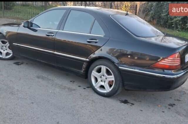 Черный Мерседес С Класс, объемом двигателя 4.97 л и пробегом 296 тыс. км за 4600 $, фото 3 на Automoto.ua