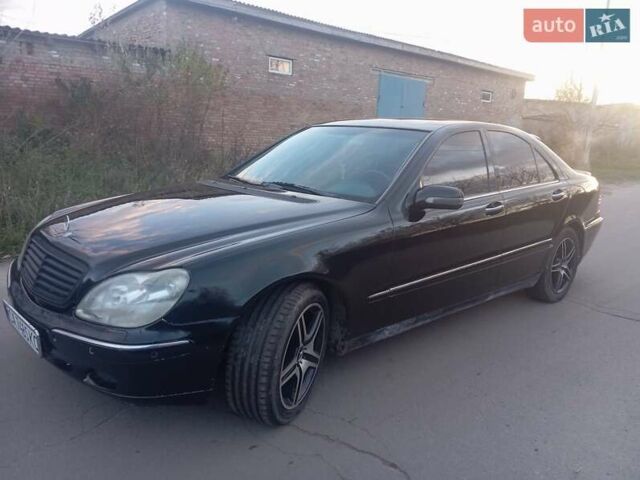 Черный Мерседес С Класс, объемом двигателя 4.97 л и пробегом 380 тыс. км за 5100 $, фото 5 на Automoto.ua