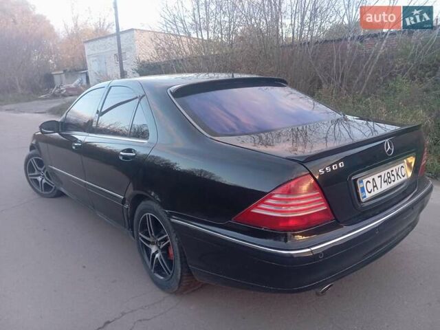 Черный Мерседес С Класс, объемом двигателя 4.97 л и пробегом 380 тыс. км за 5100 $, фото 4 на Automoto.ua