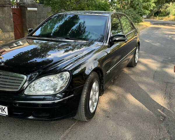 Чорний Мерседес С Клас, об'ємом двигуна 5.79 л та пробігом 153 тис. км за 16999 $, фото 8 на Automoto.ua