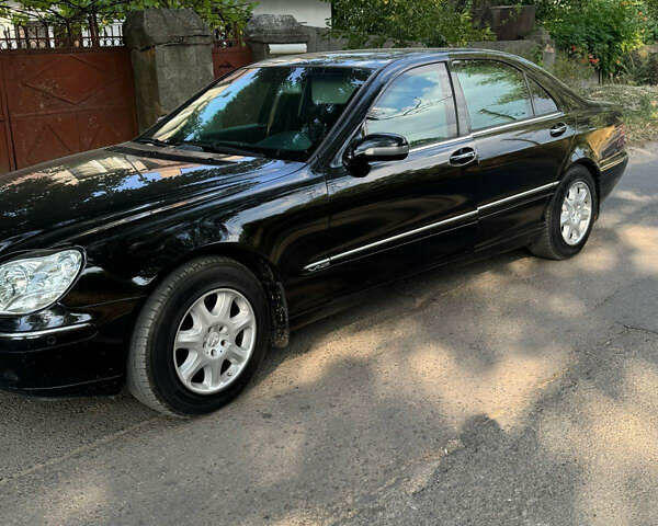 Чорний Мерседес С Клас, об'ємом двигуна 5.79 л та пробігом 153 тис. км за 16999 $, фото 7 на Automoto.ua