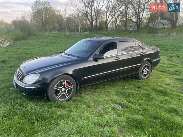 Чорний Мерседес С Клас, об'ємом двигуна 6 л та пробігом 248 тис. км за 6000 $, фото 11 на Automoto.ua